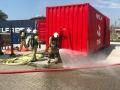 Red container with sled for fire brigade training | CBOX Containers