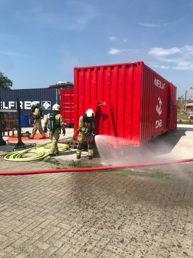 Red container with sled for fire brigade training | CBOX Containers