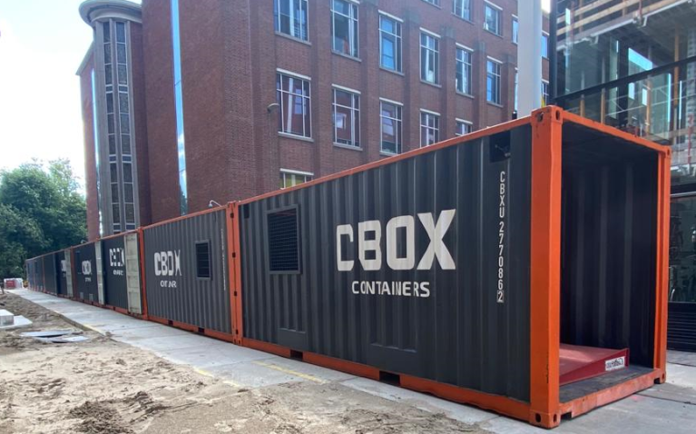 Walking and cycling tunnel at construction site | CBOX Containers